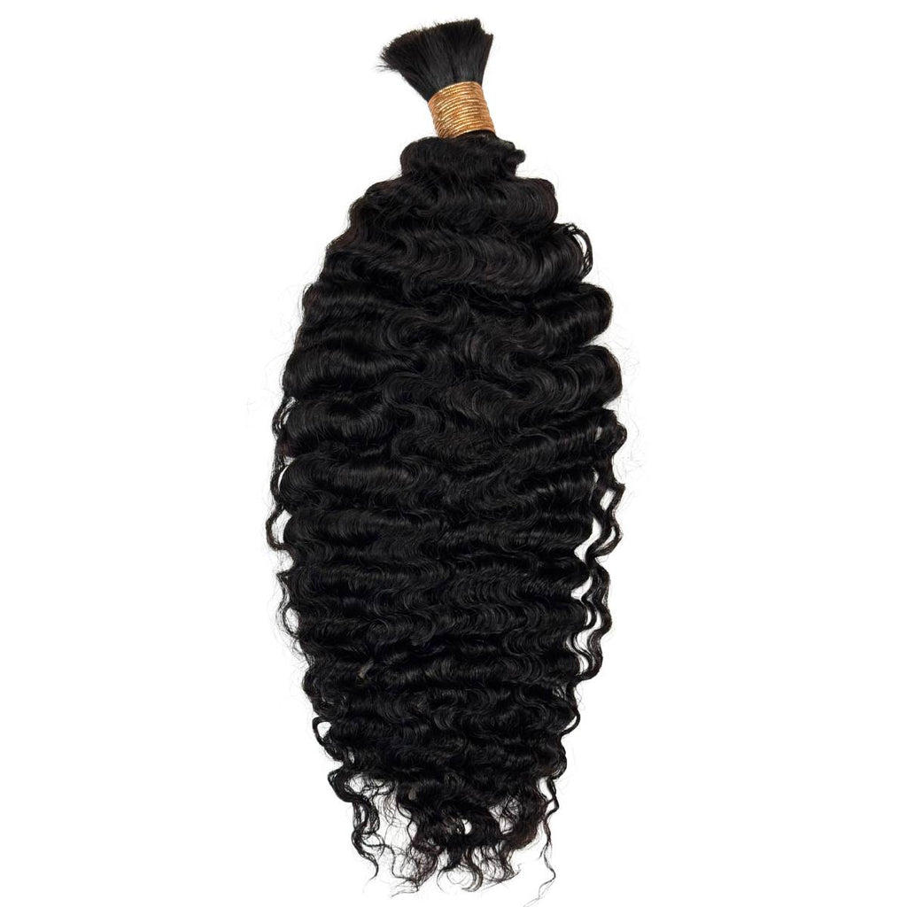 Black curly hair bundle with a gold tie on a white background